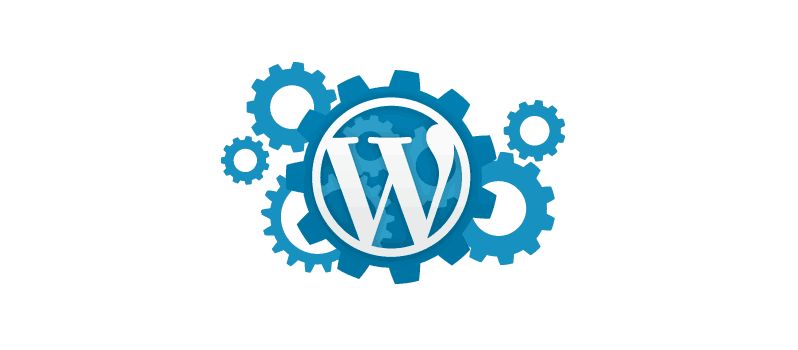 Het WordPress-logo omringd door blauwe tandwielen